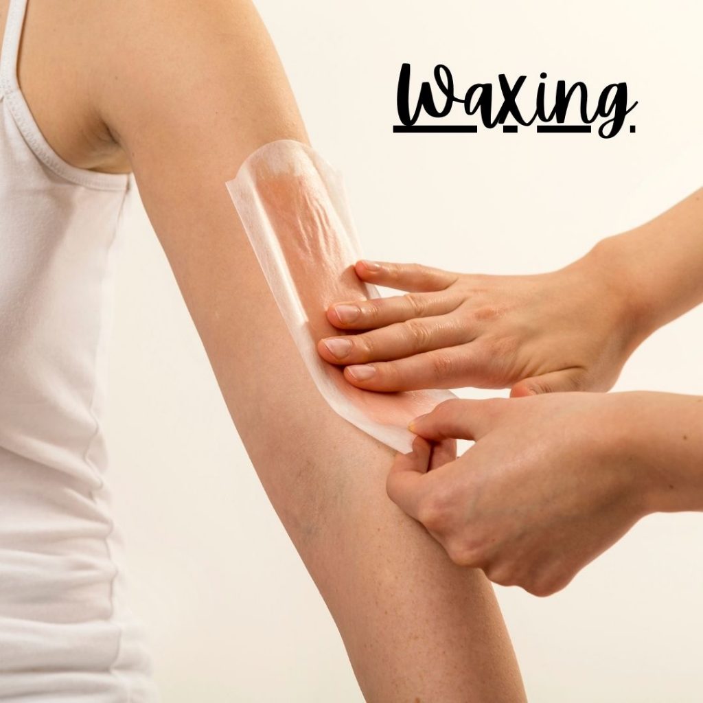Girl receiving Hand Waxing Service at Labes Women Salon - Doorstep Salon Services in Jamshedpur